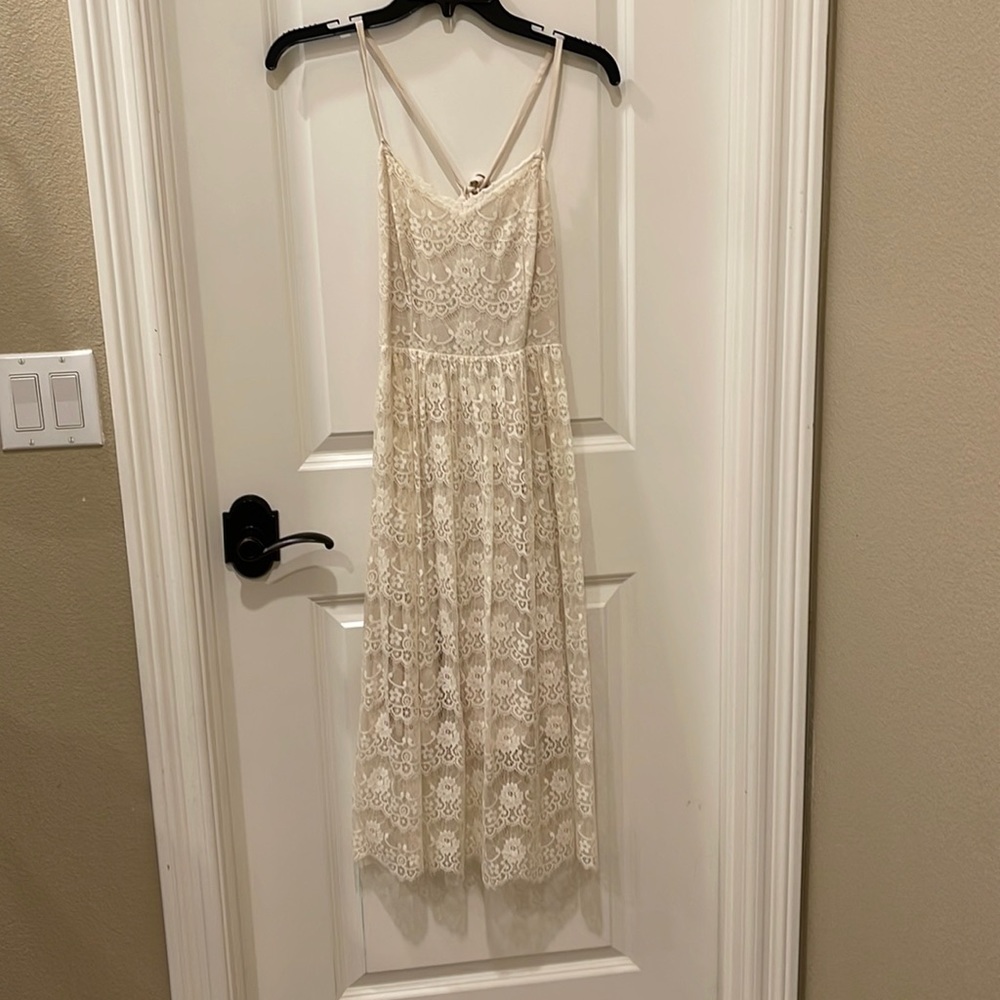 Beige lace midi dress with back cutout